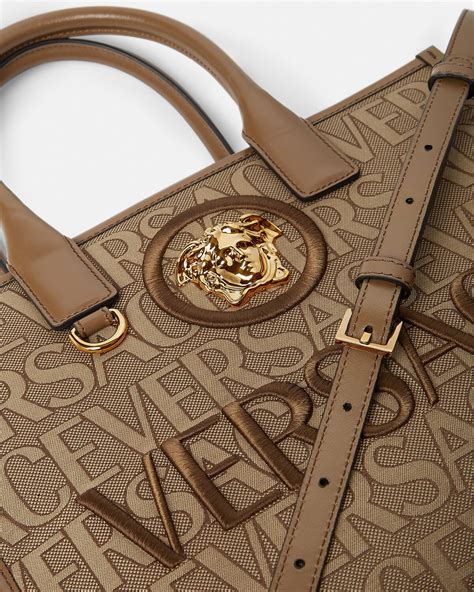 where are Versace handbags made